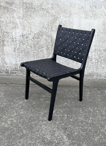 This London Dining Chair in Black from Chambers Design Timaru boasts a robust frame constructed from natural Fir wood,