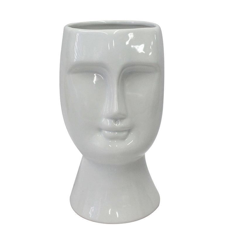 The perfect way to accent your living space. Created from high-quality ceramic material. This Face Vase looks simply stunning with a pop of bright flowers.