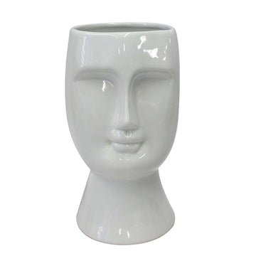 The perfect way to accent your living space. Created from high-quality ceramic material. This Face Vase looks simply stunning with a pop of bright flowers.