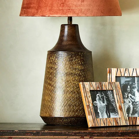 Broste Lamp Base A wide based lamp base in rich chocolate colour with hammered detailing