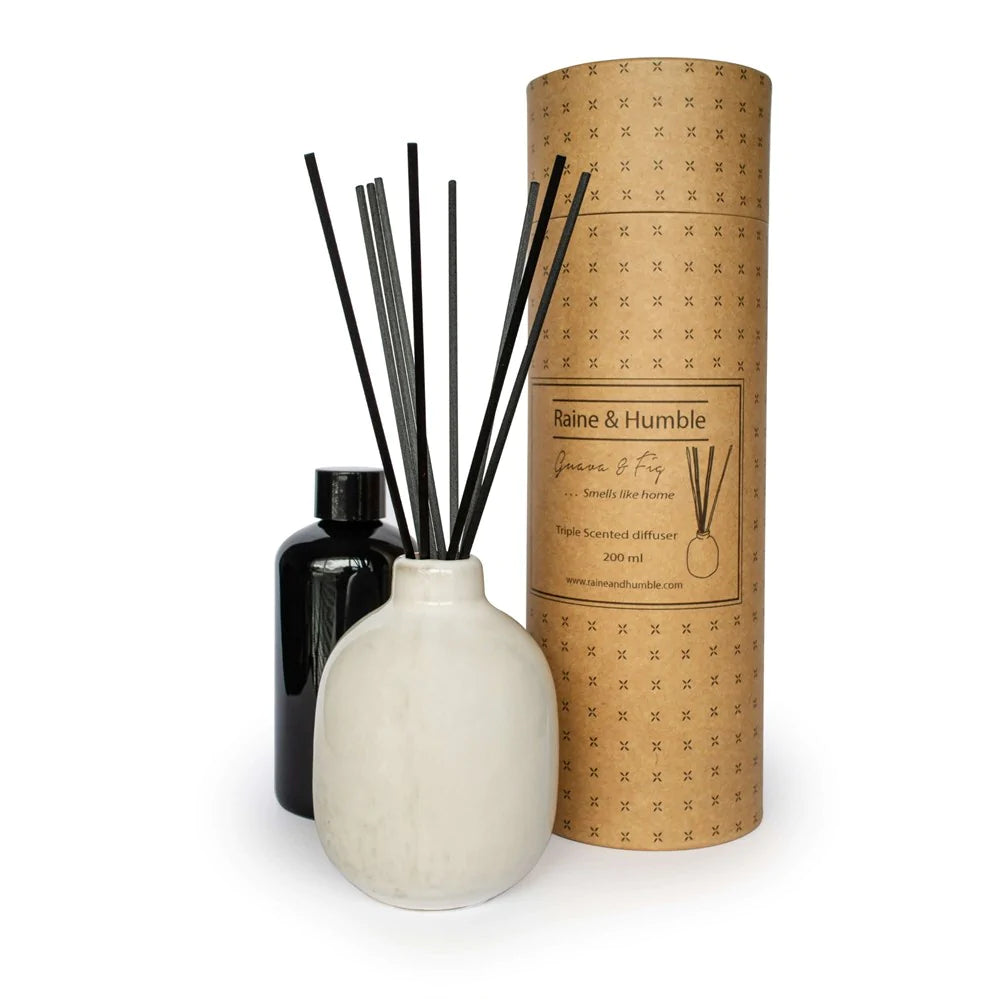 Guava and fig diffuser by Raine & Humble. Any room in the house, from the bathroom to the kitchen and beyond, can benefit from a fresh, energetic perfume because it is universally recognizable and creates a lovely, homey scent.  The fragrance comes packed nicely and includes a wonderful porcelain diffuser with black reeds and a dish, making it the ideal gift.