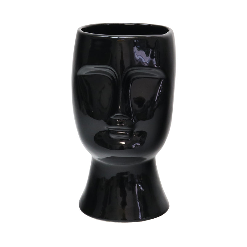 This beautiful ceramic vase, with an intriguing face design, when not being used as a flower vase, can make an elegant ornament for the house or the office. This unique vase is a show stopper in any room.