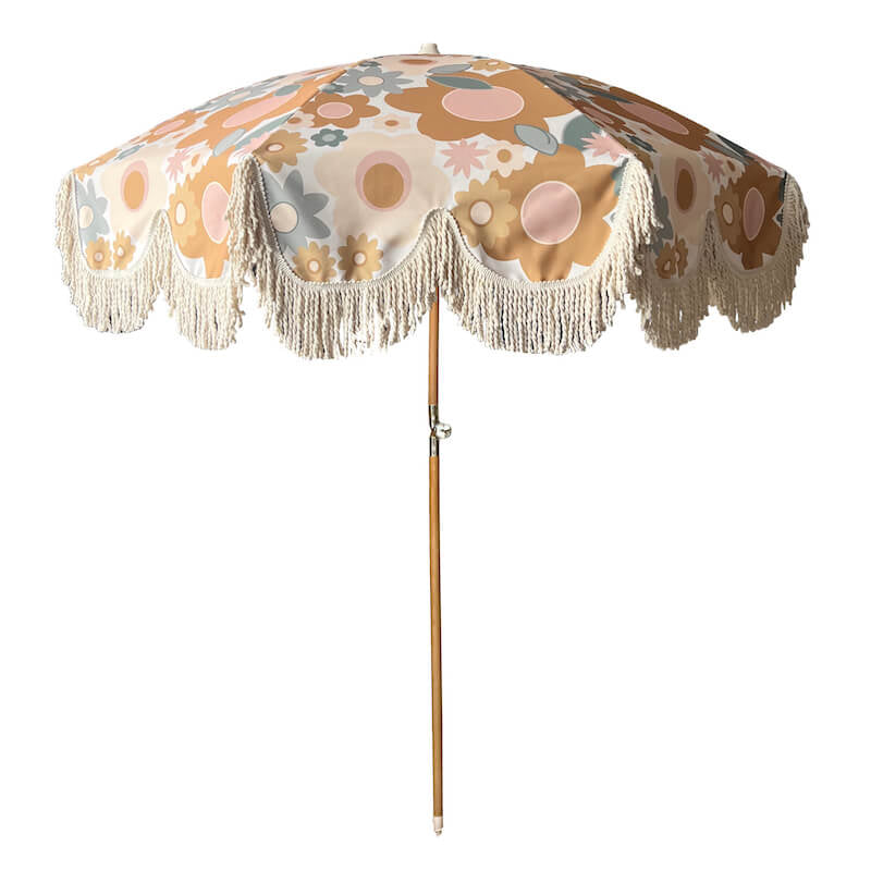 Chambers Design delivers on the Beachy Vibe. Get the ultimate beach umbrella this summer and add an extra layer of luxury to your sun protection. Inspired by the beach scenes of the 1970s, comes this premium quality sun umbrella with exaggerated scalloped edging as well as natural cotton fringing. 