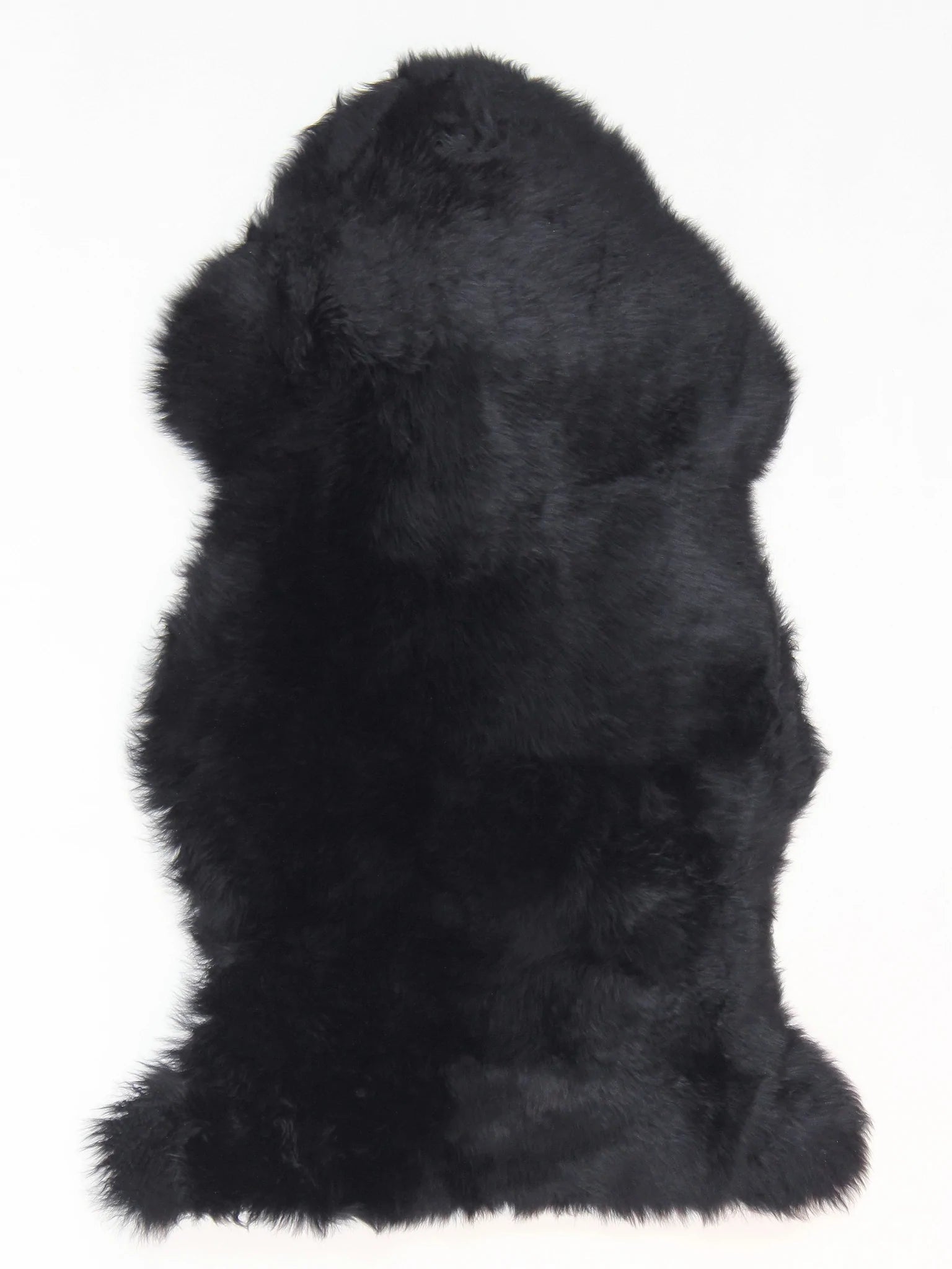 Our Long Wool Sheepskin Rugs provide a strong textural statement and a luxuriously soft touch. Sourced from sheep pastured on the lush grasslands of New Zealand. 